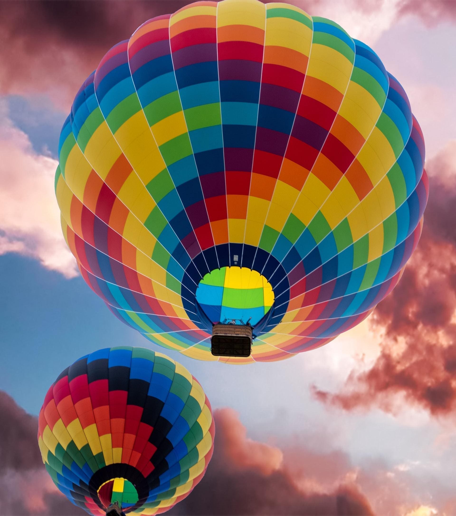 Photograph of two hot air balloons in the sunset. Image courtesy Rusty Watson.