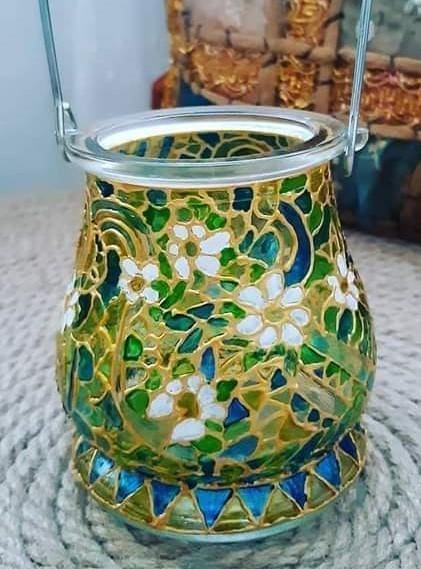 Turning ordinary objects into art: jar painted in vitrail technique.
